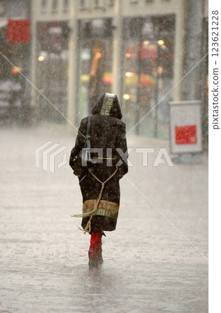 Woman in the rain Woman in the rain 123621228