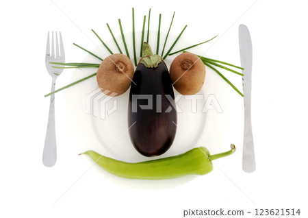 Face on a dish 123621514