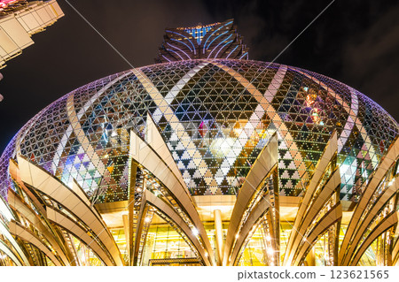 Beautiful night view of the Grand Lisboa building, the most famous, richest casino, and a luxury hotel resort stands in Macau. Beautiful night view of the Grand Lisboa building, the most famous, richest casino, and a luxury hotel resort stands in Macau. 123621565