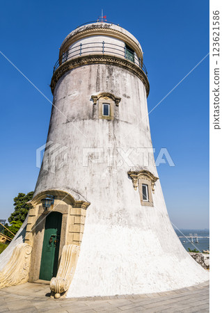 Building view of the Guia Fortress and Lighthouse in Macau, is a 17th-century Portuguese colonial military fortress and one of the UNESCO World Heritage. Building view of the Guia Fortress and Lighthouse in Macau, is a 17th-century Portuguese colonial military fortress and one of the UNESCO World Heritage. 123621586