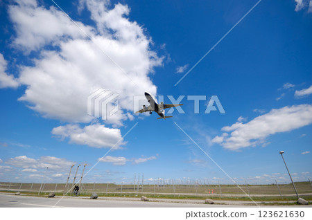 Low plane near airport Low plane near airport 123621630