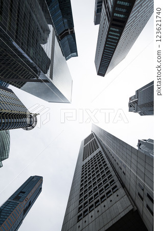 Low-angle building view of the modern office skyscrapers in the financial district of Raffles Place, Singapore. Low-angle building view of the modern office skyscrapers in the financial district of Raffles Place, Singapore. 123621740