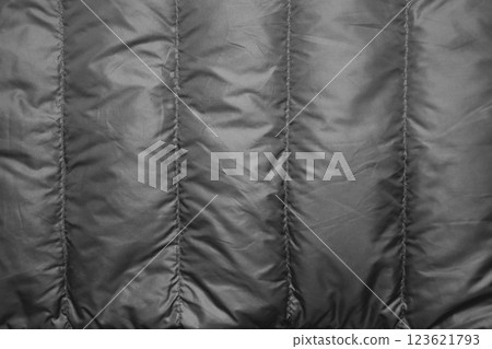 A stylish black down jacket, a winter staple 123621793