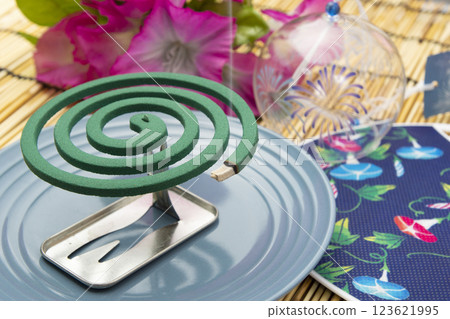Mosquito coils, wind chimes and fans create the image of summer in Japan 123621995