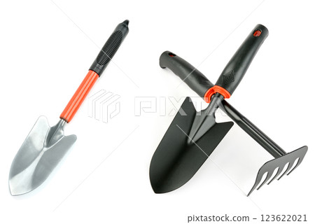 Set of garden tools (rake and shovel) isolated on white background. Set of garden tools (rake and shovel) isolated on white background. 123622021