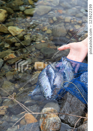 Children playing on the river 123622199