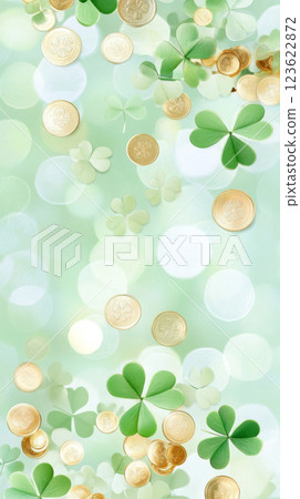 St. Patricks Day clovers and gold coins on green glitter background 123622872