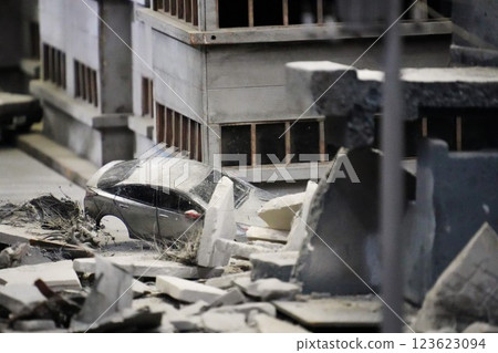 Miniature of collapsed building and wrecked car Miniature of collapsed building and wrecked car 123623094