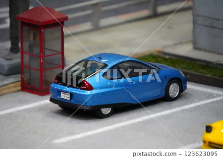 Miniature retro cars parked in a parking lot Miniature retro cars parked in a parking lot 123623095