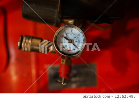 Close-Up of Pressure Regulator Gauge on Industrial Equipment 123623493