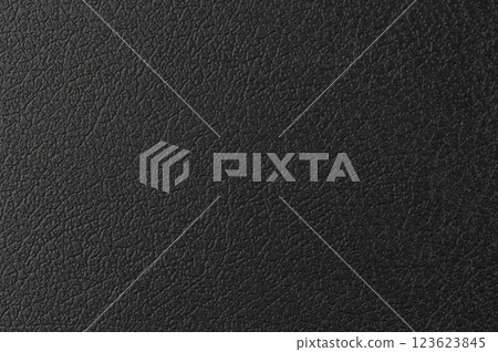 Textured black surface with intricate patterns showing depth and dimension details 123623845