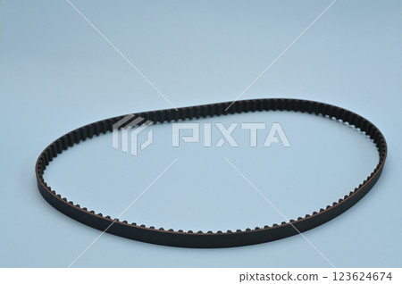 timing belt on a blue background. close-up timing belt on a blue background. close-up 123624674