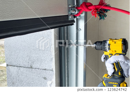 Assembly of sectional gates. 123624742