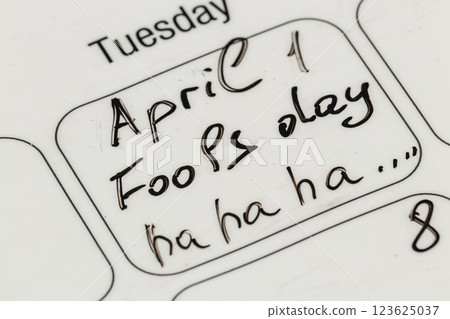 Calendar notes for April Fools' Day featuring playful handwriting Calendar notes for April Fools' Day featuring playful handwriting 123625037