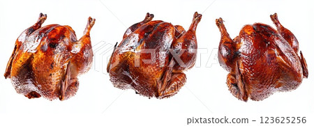 Whole roasted chicken with crispy golden and brown skin, isolated on white background with clipping path 123625256