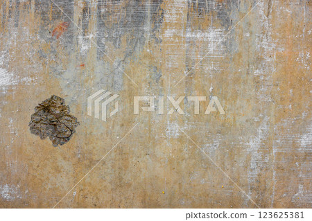 concrete wall with yellow stains impact damage and plaster leftovers concrete wall with yellow stains impact damage and plaster leftovers 123625381