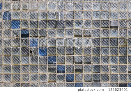 Old glass block wall texture, frosted glass brick wall background Old glass block wall texture, frosted glass brick wall background 123625401