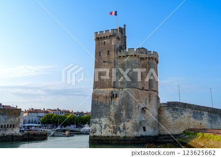 The historic 14th-century Tour de la Lanterne dominates La Rochelle s Old Harbor The historic 14th-century Tour de la Lanterne dominates La Rochelle s Old Harbor 123625662