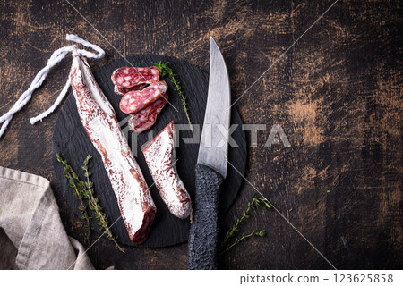 Salami sausage fuet with spice 123625858