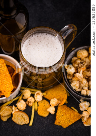 Beer and different snacks for Superbowl or football party 123625889