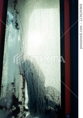 Frost on the driver's window Frost on the driver's window 123626968