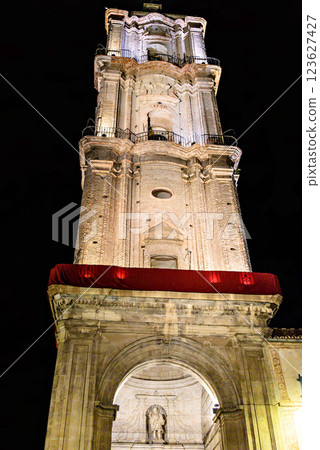 Tower of the Church of San Juan Bautista in Malaga, Andalusia. Night photo, selective focus 123627427