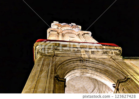 Tower of the Church of San Juan Bautista in Malaga, Andalusia. Night photo, selective focus 123627428