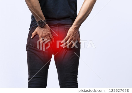 People with digestive problem touching his buttock, man with hemorrhoid problem on isolated background, People with diarrhea problem 123627658