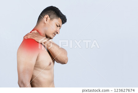 Shirtless person with neck muscle pain, Neck pain and stress concept, Close-up of a man with neck pain, a man with neck pain on an isolated background 123627674