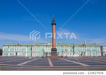 Russia, St. Petersburg, July 19, 2020 Palace Square, in the photo the building of the Hermitage and the Pillar of Alexandria, tourists walking around the square. Russia, St. Petersburg, July 19, 2020 Palace Square, in the photo the building of the Hermitage and the Pillar of Alexandria, tourists walking around the square. 123627836