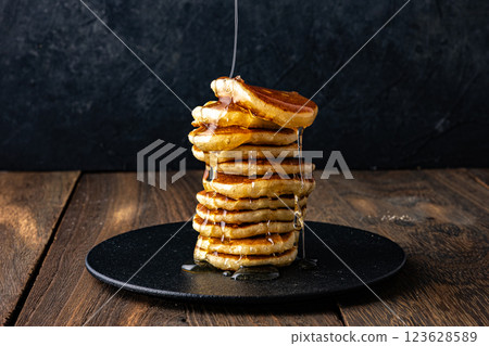 Honey on a pancake Honey on a pancake 123628589