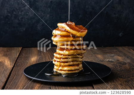 Honey on a pancake 123628590