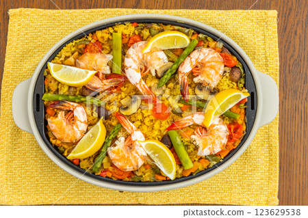 Paella is a typical Spanish rice dish. 123629538