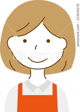 A woman wearing an apron 123630276