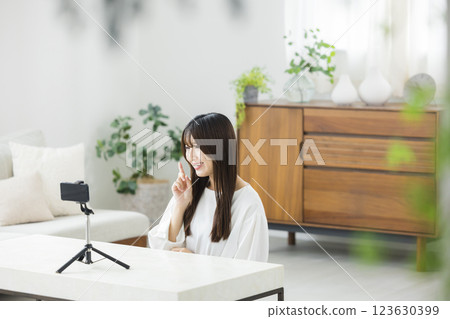 A woman to take with a smartphone 123630399