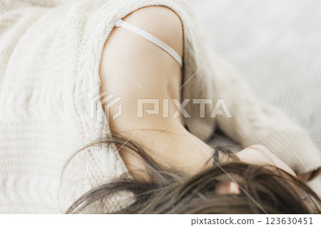 Woman in white knit 123630451