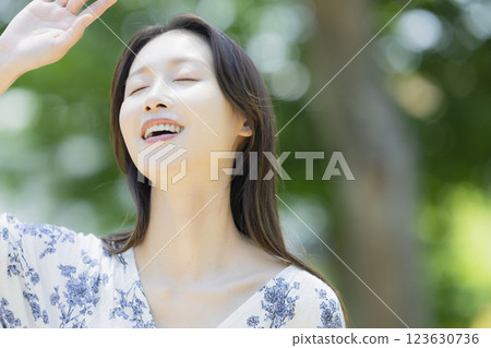 A woman in fresh green 123630736