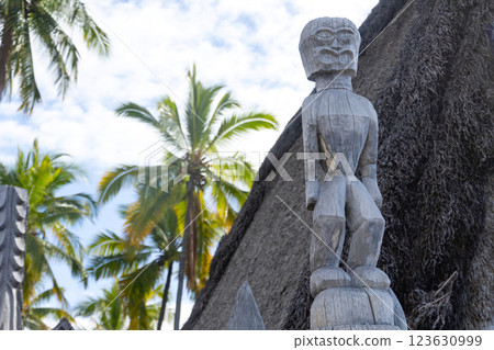 Wooden statue of Hawaiian god in the national historical park. 123630999