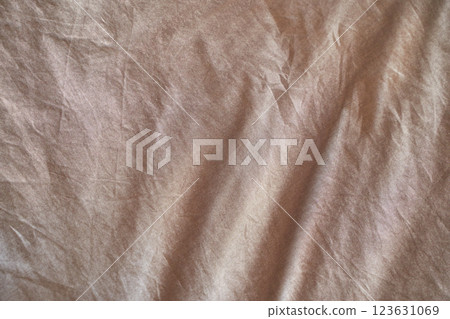 Vintage brown textured fabric with natural folds and wrinkles for rustic Vintage brown textured fabric with natural folds and wrinkles for rustic 123631069