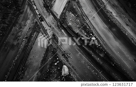 Abstract view of tire tracks on a gritty surface creating a winding pattern. Generate Ai 123631717