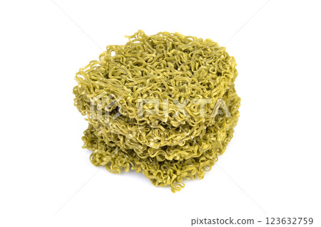 Japanese style green noodles,Uncooked dry instant vegetable noodle,Crispy jade noodles isolated on white background 123632759