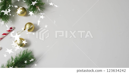 Image of stars over christmas decorations 123634242