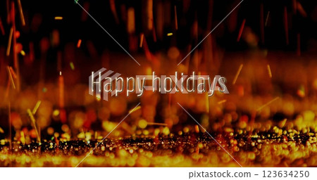 Image of happy holidays text over yellow rocks falling Image of happy holidays text over yellow rocks falling 123634250