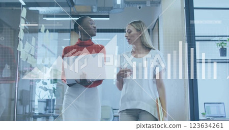 Image of financial data processing over diverse business people in office Image of financial data processing over diverse business people in office 123634261