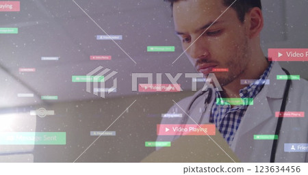 Medical professional working with data processing image overlaid with image Playing text Medical professional working with data processing image overlaid with image Playing text 123634456