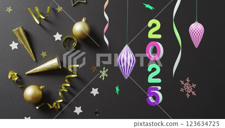 Image of 2025 text and christmas decorations in background 123634725