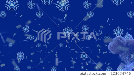 Image of christmas confetti and champagne over snow falling Image of christmas confetti and champagne over snow falling 123634746