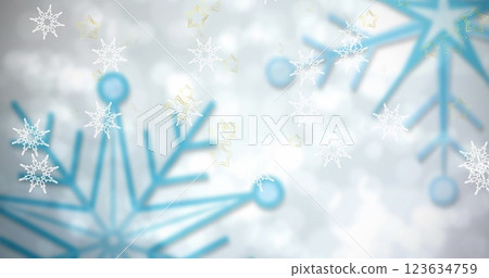 Image of snowflakes falling over spots of light against grey background with copy space 123634759