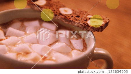 Image of yellow spots and cocoa with marshmallows at christmas Image of yellow spots and cocoa with marshmallows at christmas 123634903