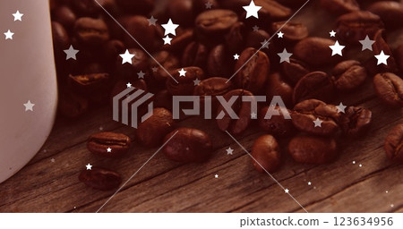 Image of stars falling over coffee at christmas Image of stars falling over coffee at christmas 123634956